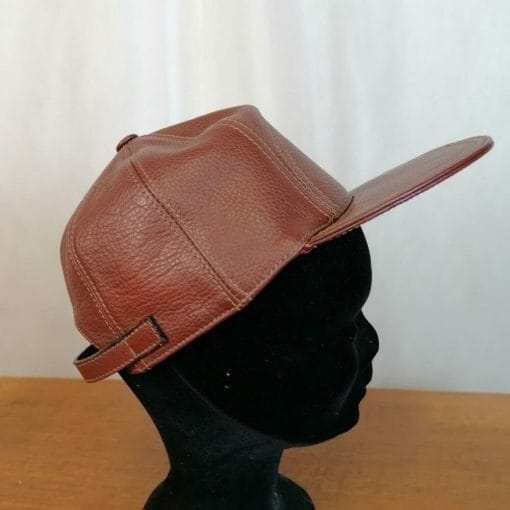 cappellino con visiera in pelle vintage