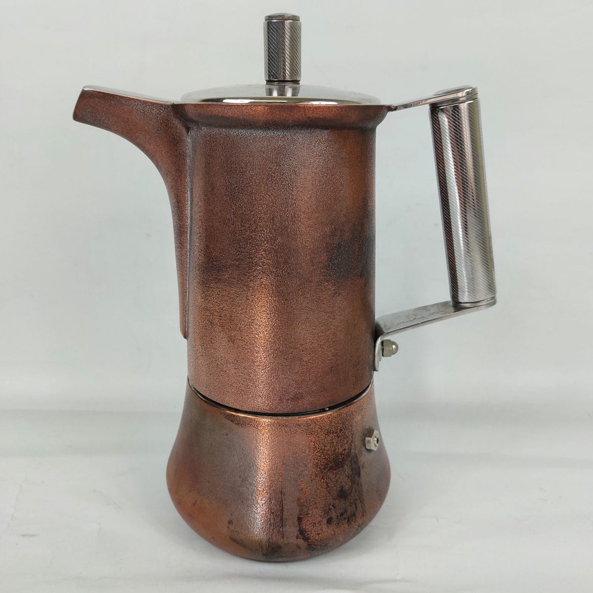 Moka Serafino Zani Genesis in rame, design italiano originale. Caffettiera completa e funzionale, con eleganti dettagli e stile unico.